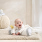 Tummy time roll with cloud print, yellow star, plush cloud end; baby leaning on it
