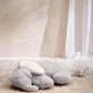 Elephant plush tummy time rug, light gray with cream inner ears and soft tail detail