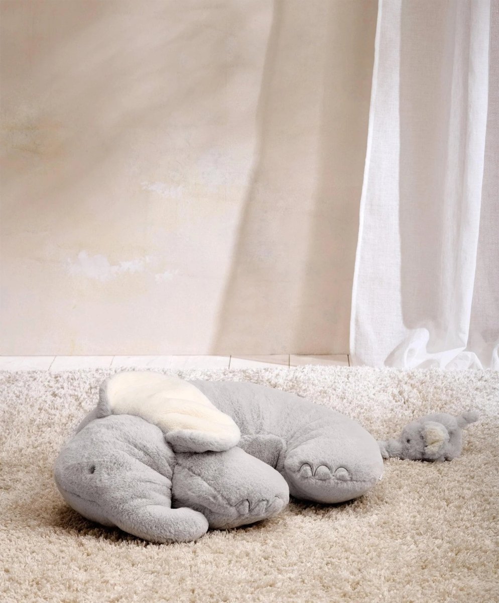 Elephant plush tummy time rug, light gray with cream inner ears and soft tail detail