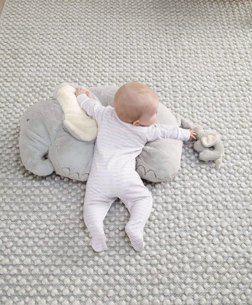 Elephant plush tummy time rug, light gray with cream ears and baby in striped romper