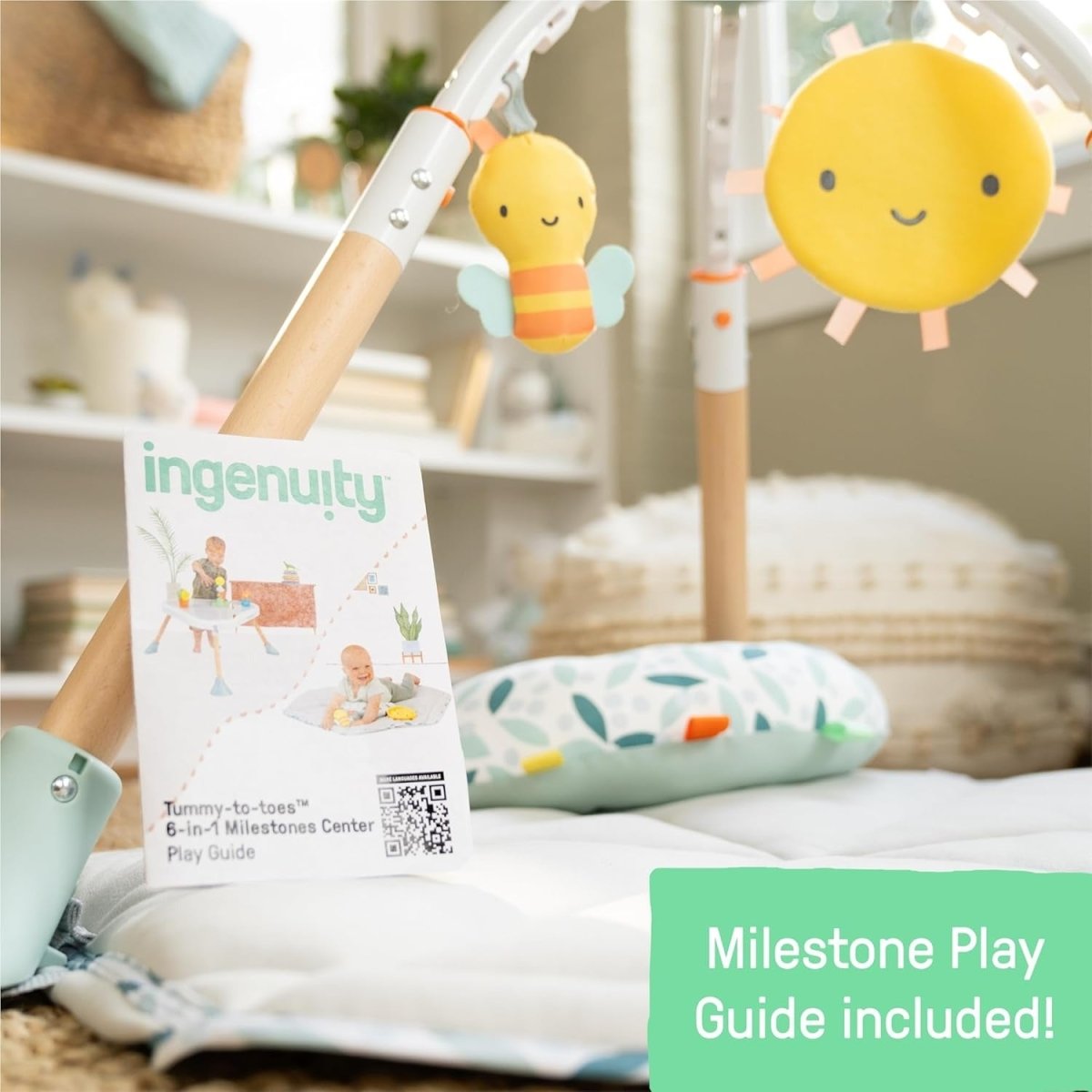 Infant play center hanging toys, including a yellow sun and plush figures