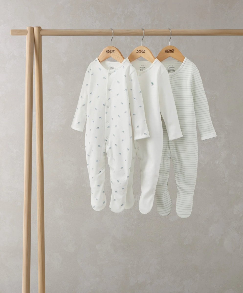 Baby sleepsuit set of 3: white printed, white solid, and light striped footed onesies