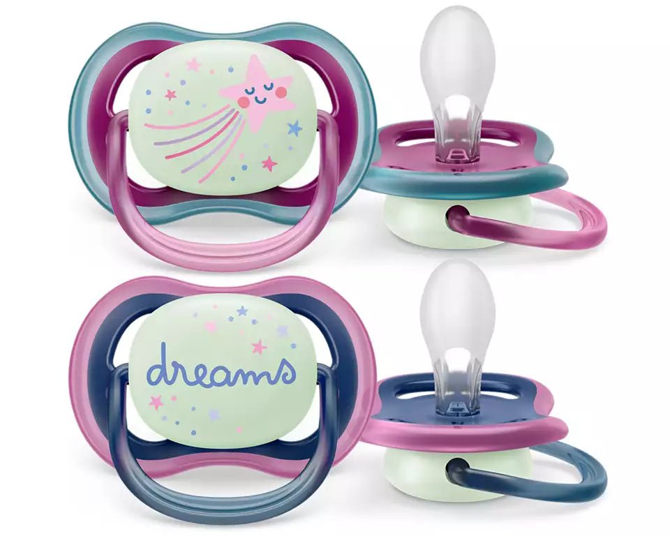 Two baby pacifiers with light bulb teats, purple/pink frames, 'dreams' panel
