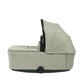 Vardo carrycot in sage green with hood and padded base
