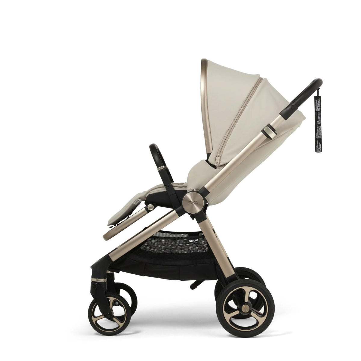 Vardo pushchair in shell color with cream seat and canopy, angled view