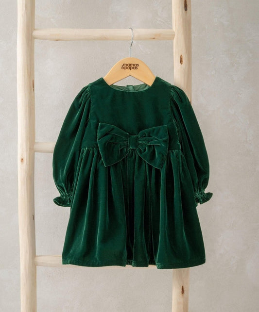 Green velvet bow dress with gathered skirt and puff sleeves