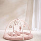Pink bunny playmat with arch and soft pink padded floor, hanging plush toys