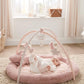 Pink bunny playmat with rounded padded base, arched frame, hanging heart and plush toys