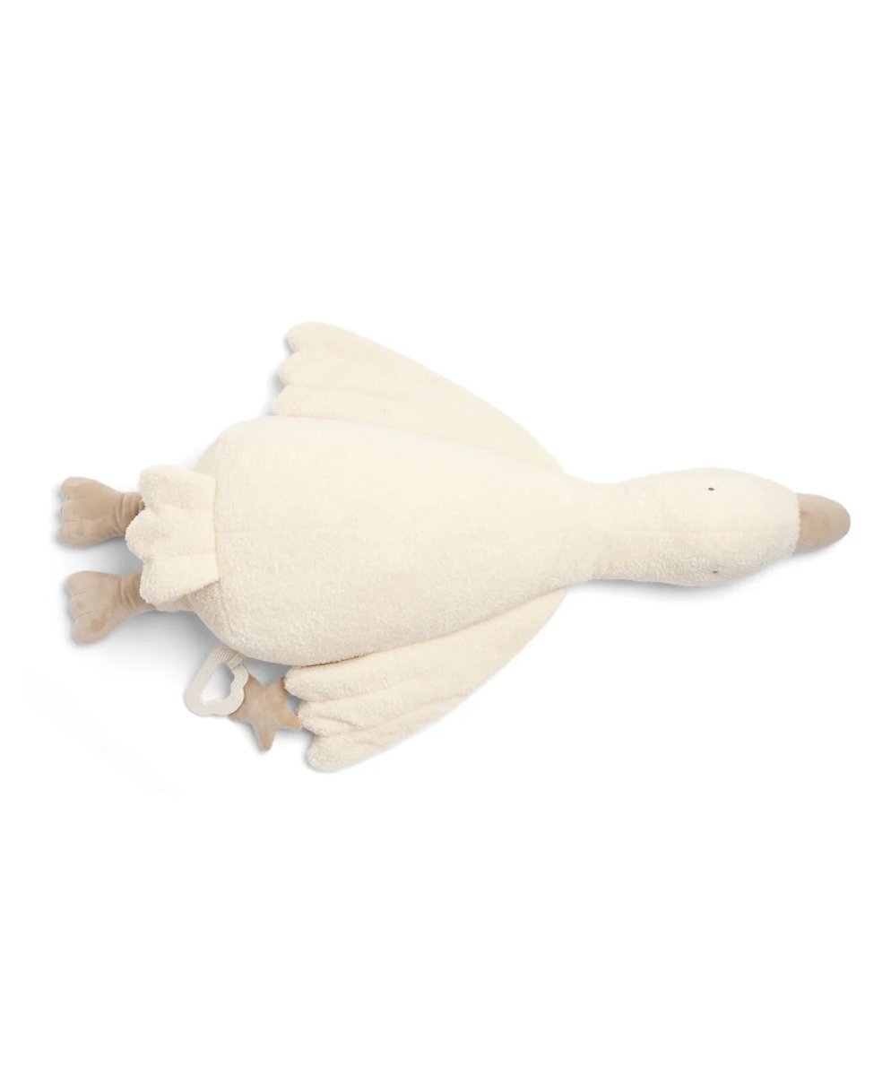 Light cream plush tummy time duck, side view with wings spread and feet out.