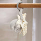 Safari linkie soft toy with plush giraffe, star and elephant attachments on a hanging clip