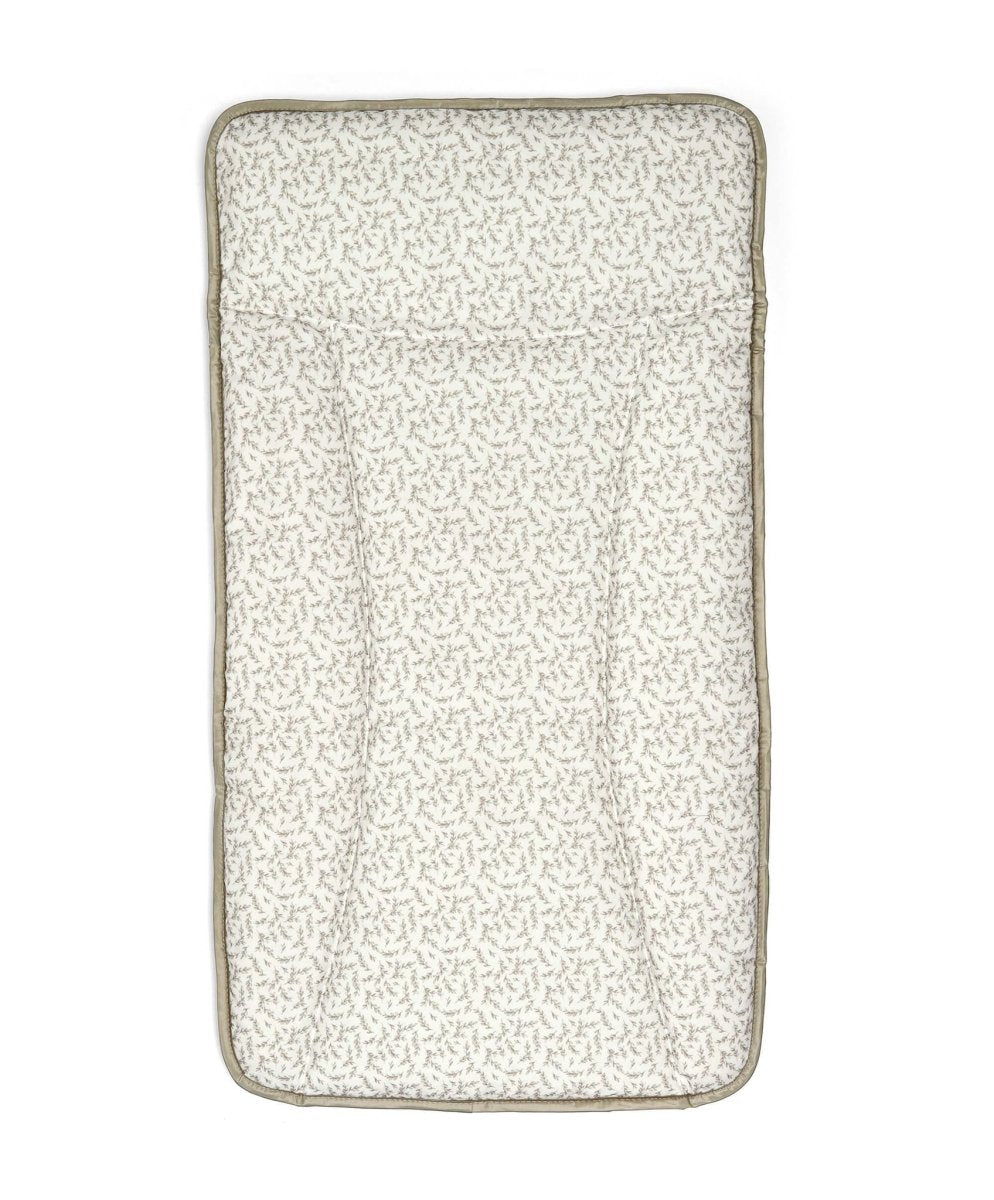 Leaf changing mattress insert with light cream textured fabric and gray piping