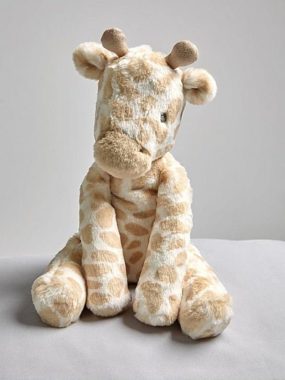 Stuffed giraffe plush toy with long neck and spotted pattern, beige and cream.