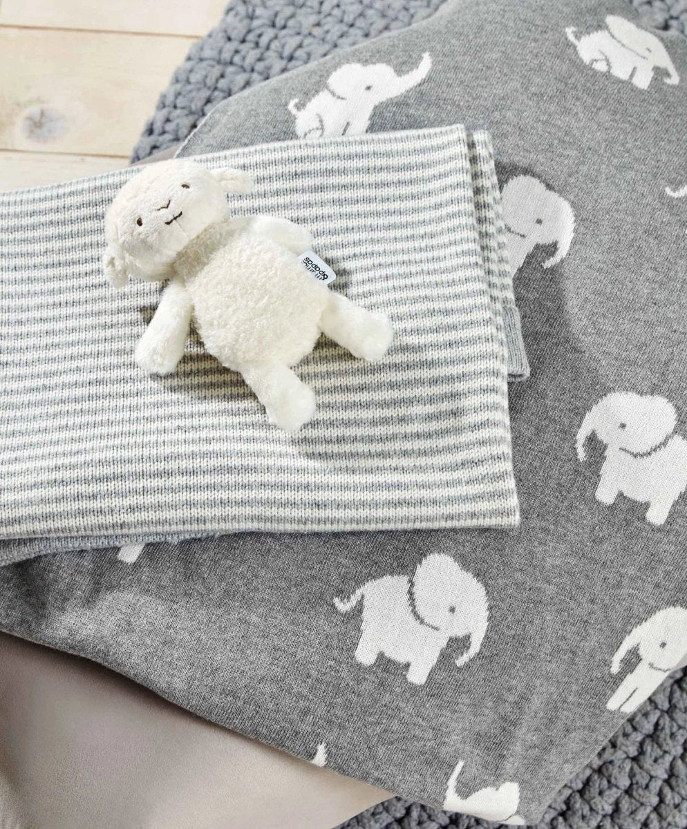 Beige lamb beanie hat with striped knit and attached plush lamb on gray elephant fabric