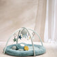Blue round baby play mat with arched toy bar and sea-themed plush sea creatures
