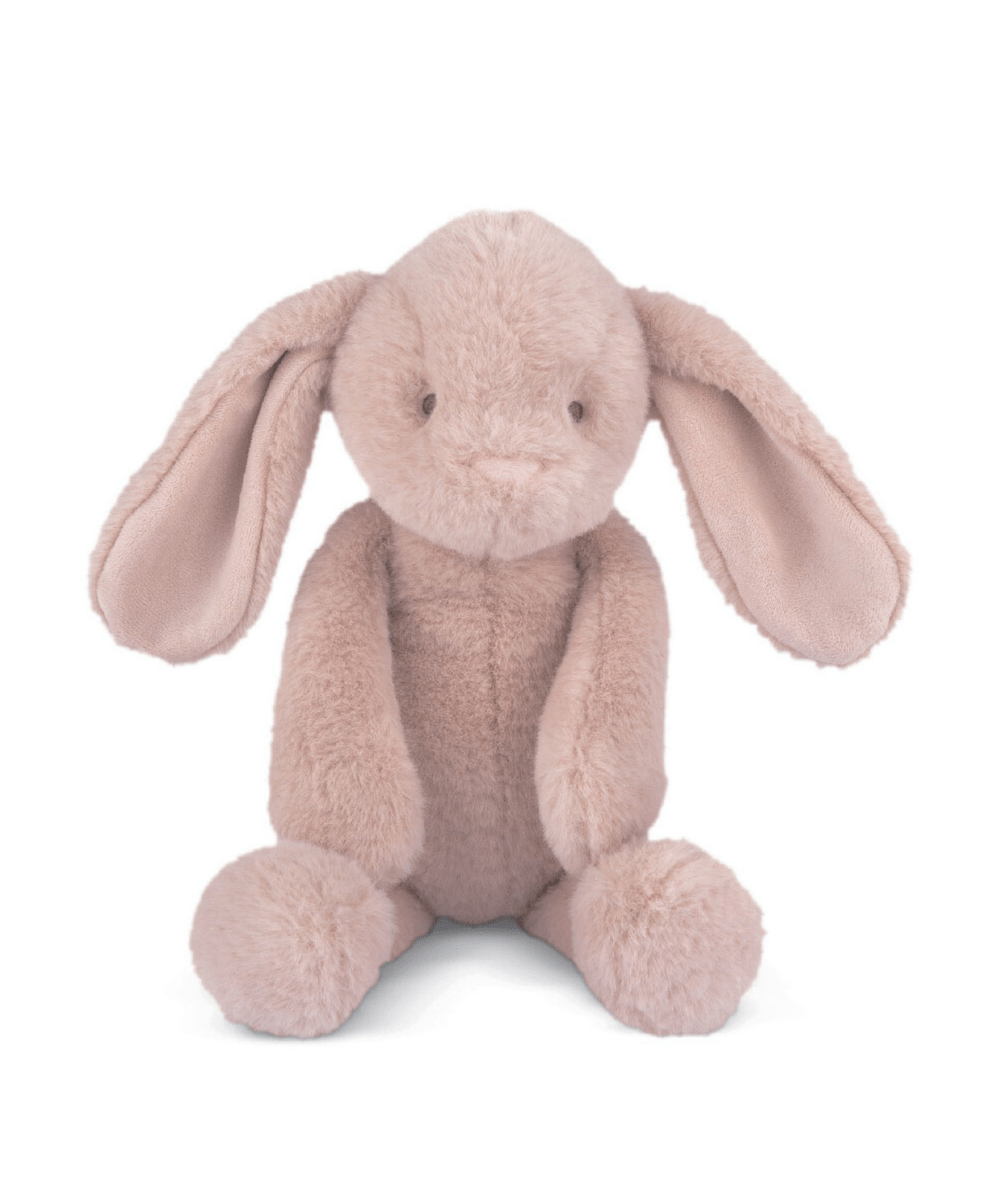 Light pink plush bunny soft toy, floppy ears and round snout, seated stance.