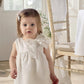 White organza bow dress, sleeveless with pleated bodice and gathered skirt