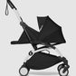 Black newborn stroller seat pack with canopy, side view and wheels