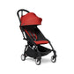 Red and black baby stroller with canopy and 4 wheels