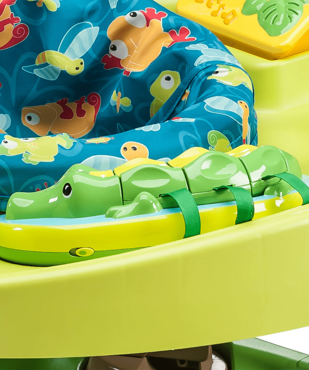 Blue fabric play panel with fish and whale graphics on green tray edge