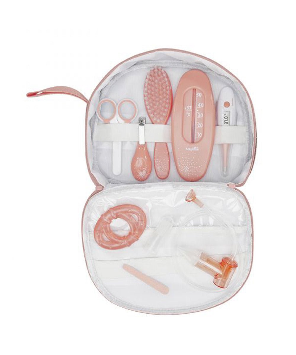Open baby care kit pouch with pink and white grooming tools and accessories