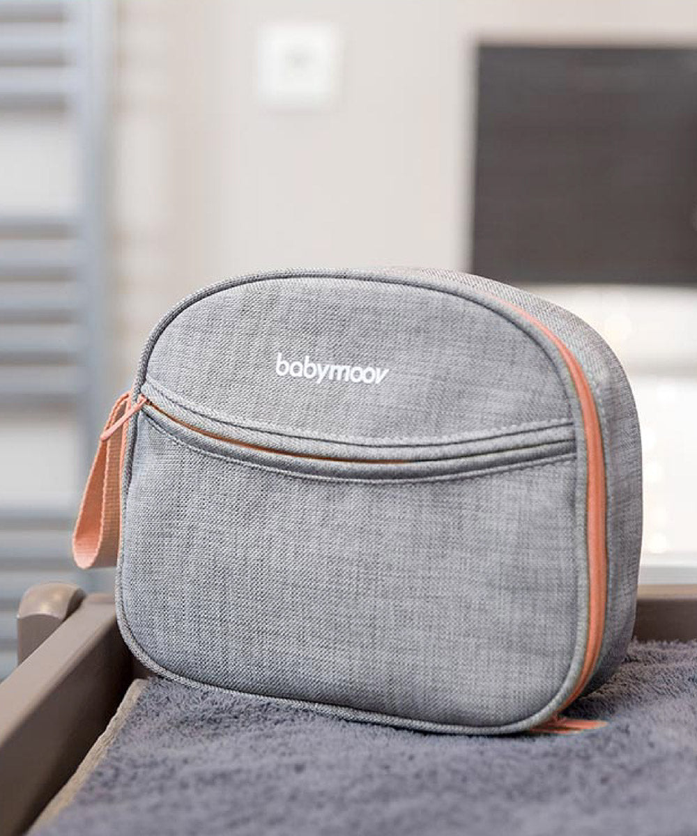 Gray baby care zip pouch with coral trim and carry loop, front view
