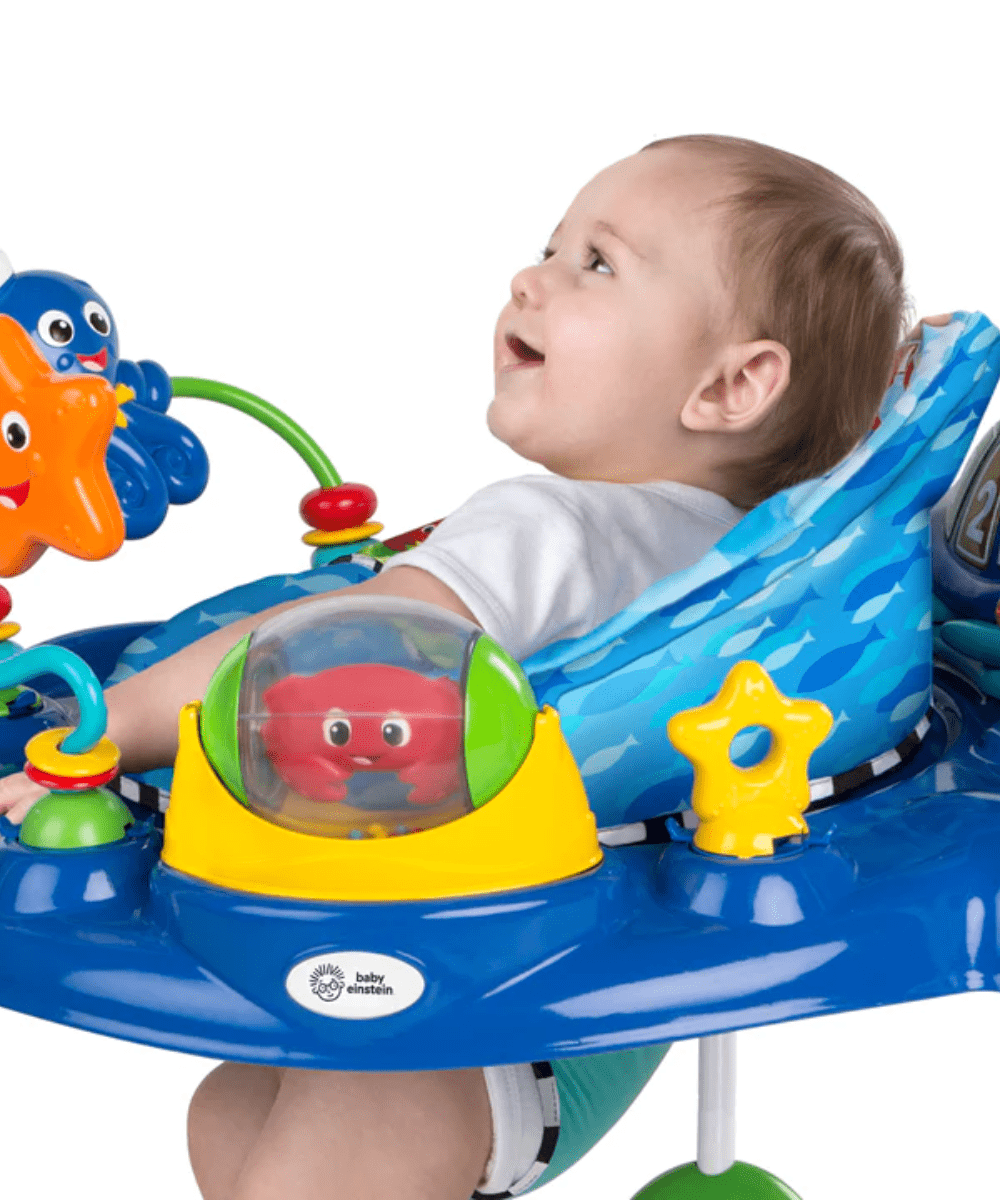 Neptune’s Ocean jumper with baby in blue seat and clear fish toy on front