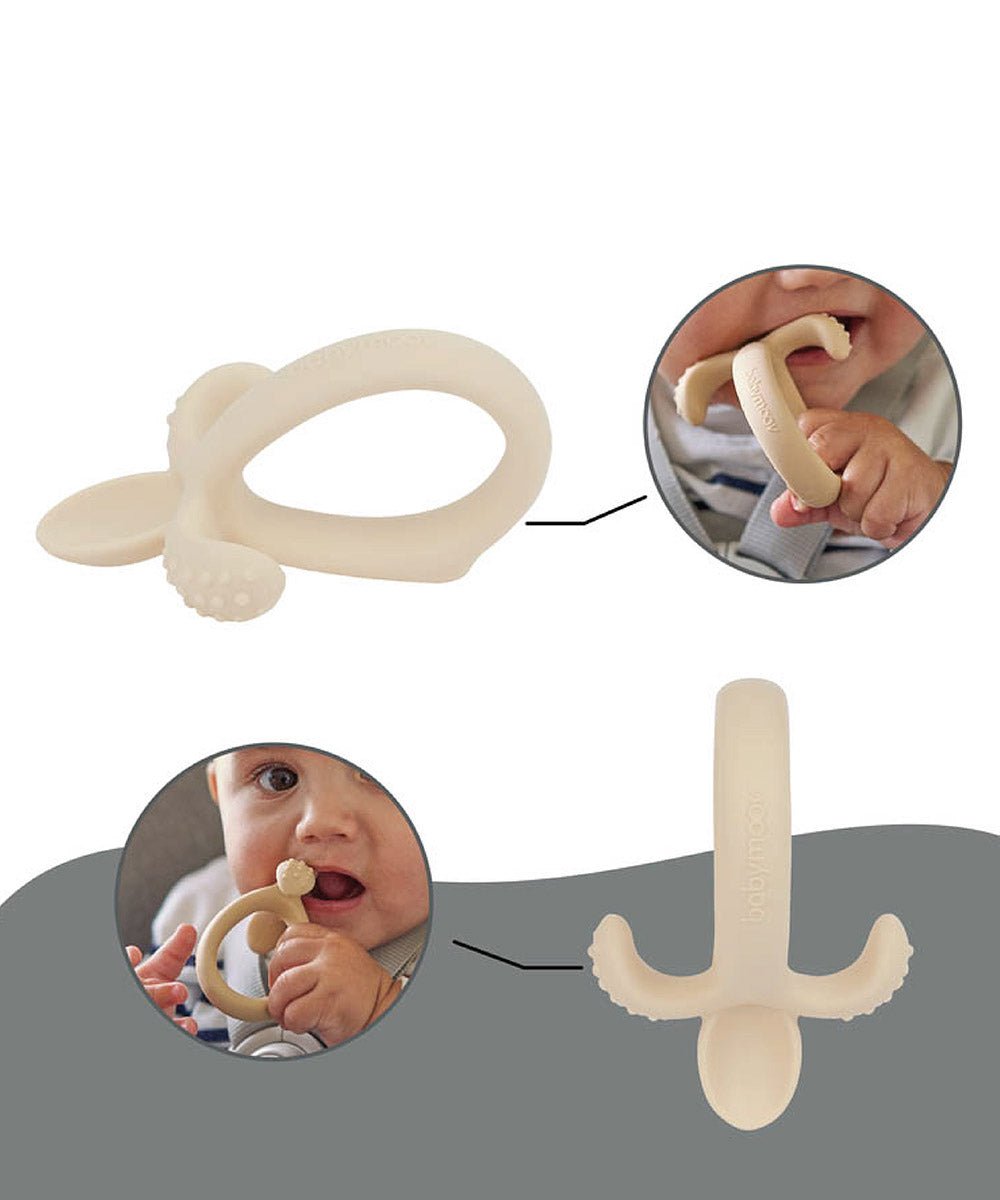 Beige silicone feeding spoon set with matching bowl and bib, baby using spoon