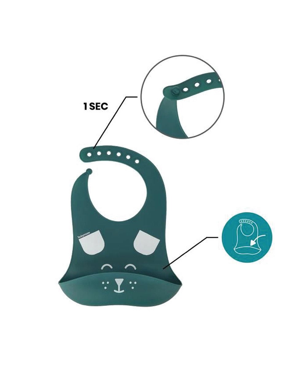 Teal silicone baby bib with cat face pattern and hanging loop, with spoon