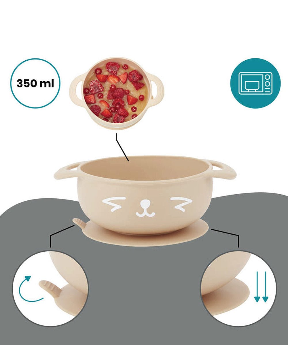 Beige silicone bowl filled with food, plus matching bib and feeding spoon set