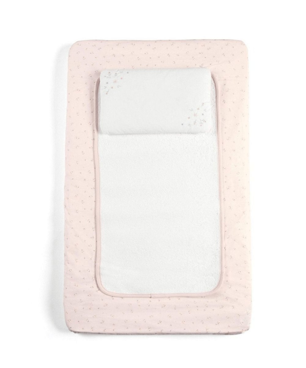 Pink changing mattress with speckled cover and white padded insert
