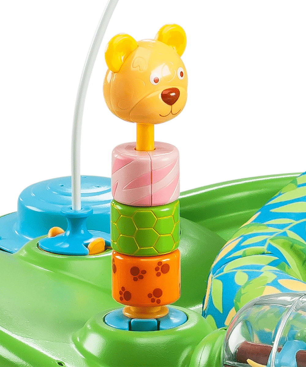 Zoo animal toy on activity center: yellow lion figure on stacked rings with blue base
